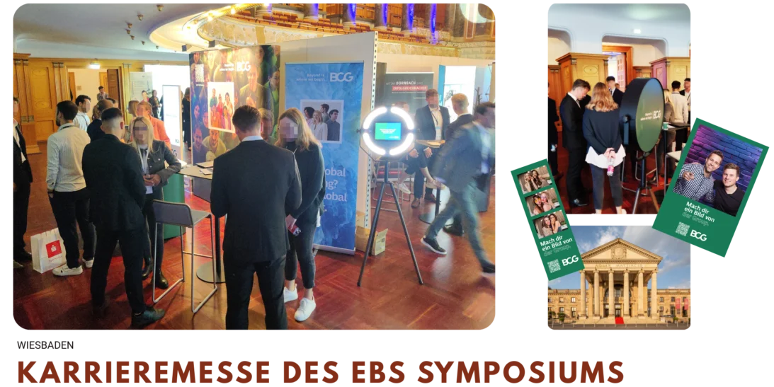 Teilnehmer und Studierende besuchen die Karrieremesse des EBS Symposiums und interagieren mit den Messeständen von Unternehmen wie BCG, die auch eine Fotobox anbieten.